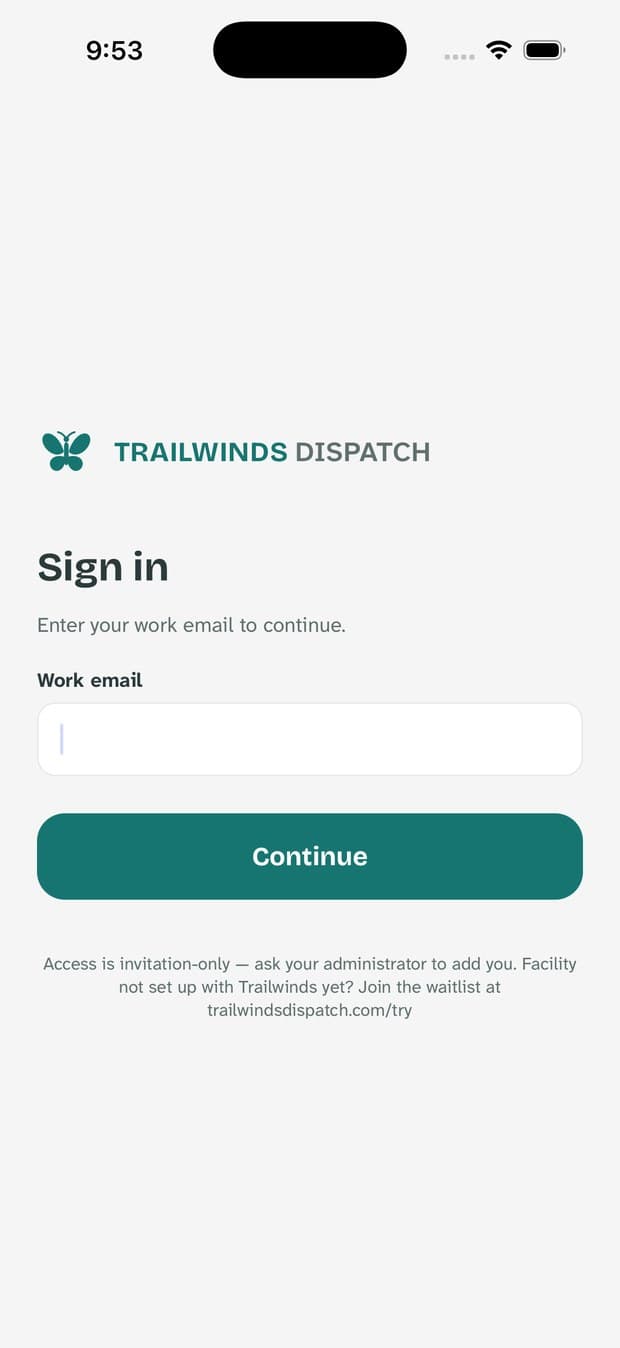 The app sign-in screen asking for a work email.